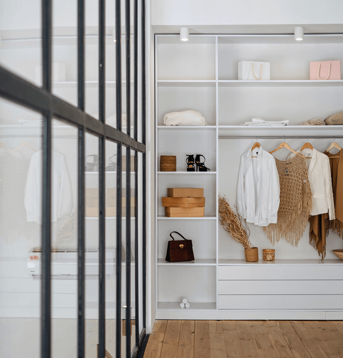 wall divider and shelves in walk-in closet