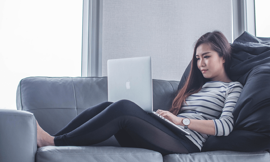 woman sitting on a couch Securely